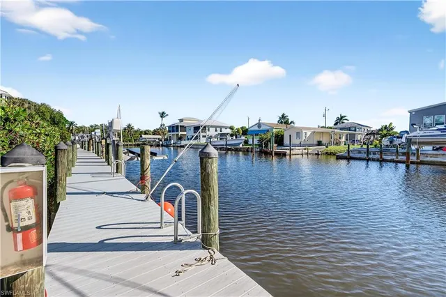 a view of a lake with sitting area