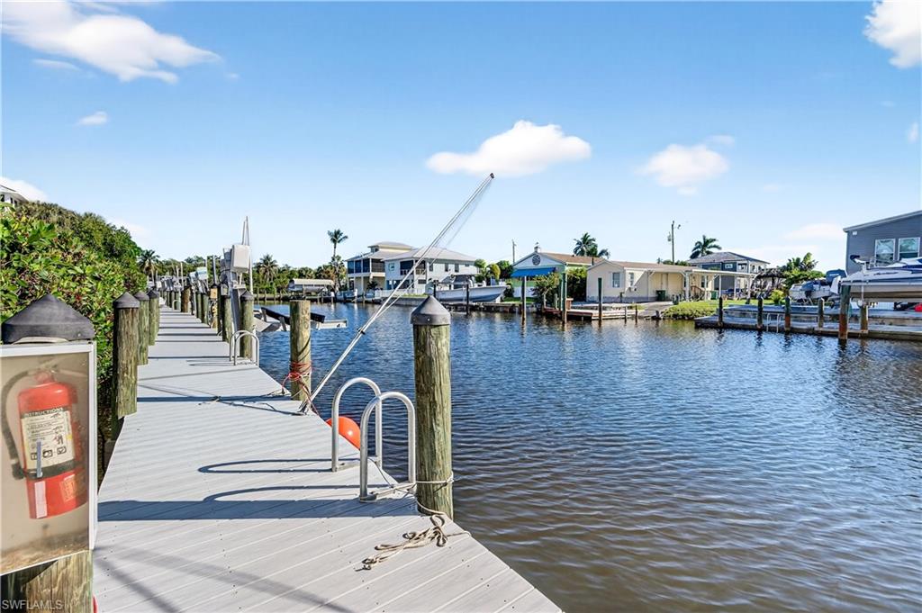 322 Angler Drive, Unit 502 Goodland, FL 34140 - Photo 32 of 38 Dock with 13,000LB boat lift