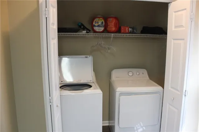 a utility room with dryer and washer