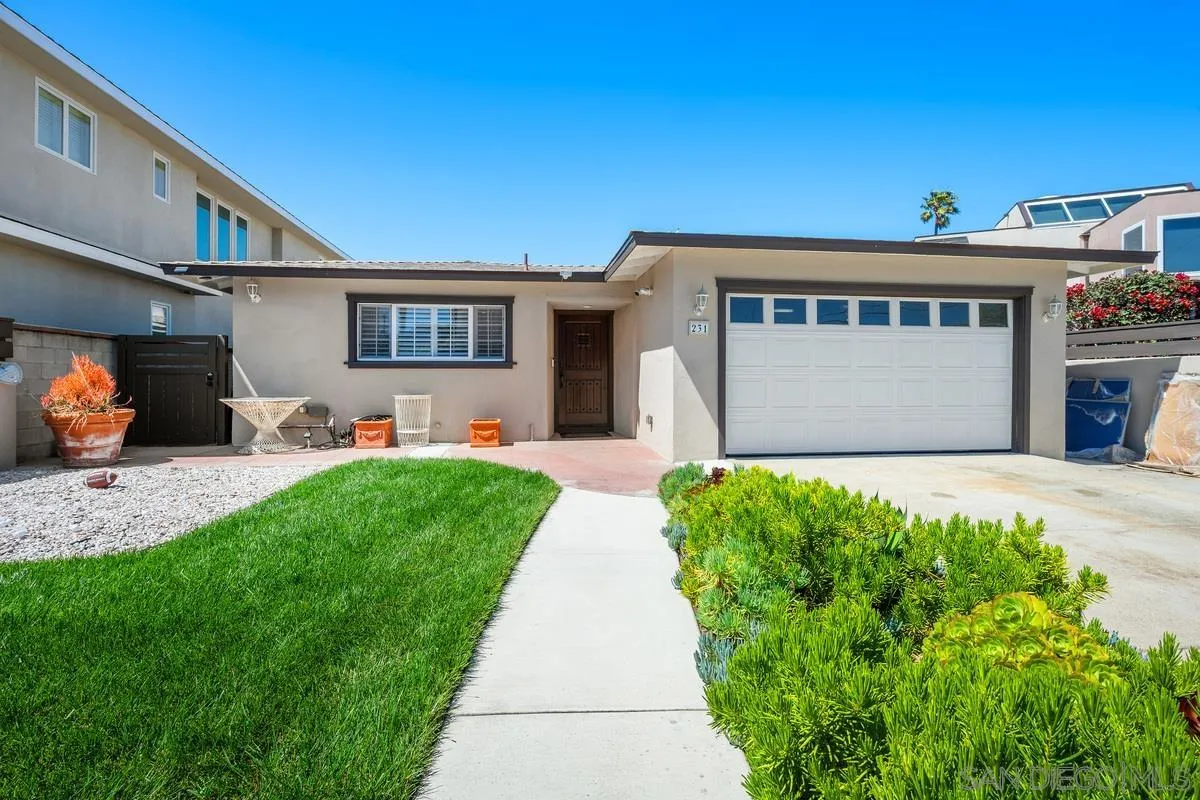 231 Sunridge Street Playa del Rey, CA 90293 - Photo 1 of 28 a front view of a house with a yard and potted plants