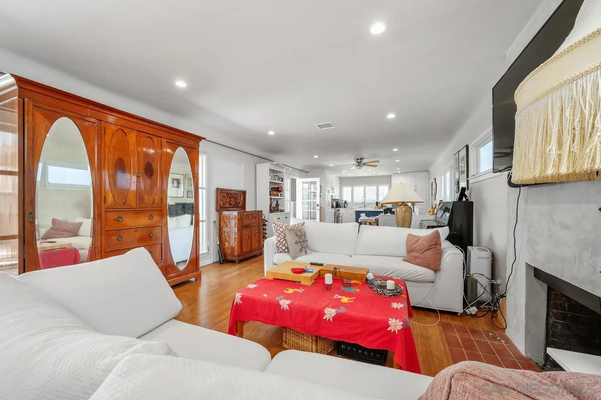 231 Sunridge Street Playa del Rey, CA 90293 - Photo 21 of 28 a living room with furniture fireplace and large windows