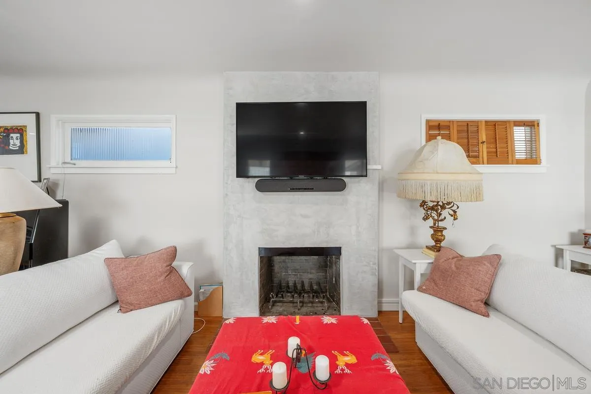 231 Sunridge Street Playa del Rey, CA 90293 - Photo 22 of 28 a living room with furniture and a flat screen tv