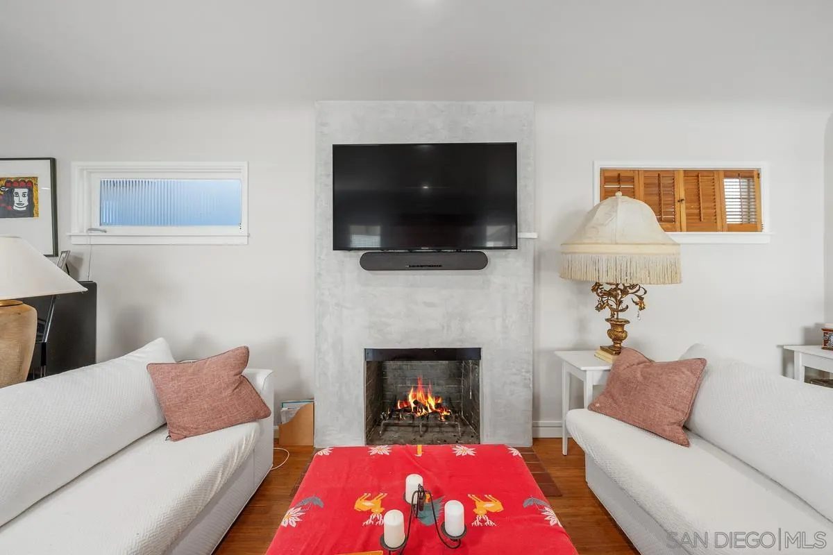 231 Sunridge Street Playa del Rey, CA 90293 - Photo 23 of 28 a living room with furniture and a fireplace