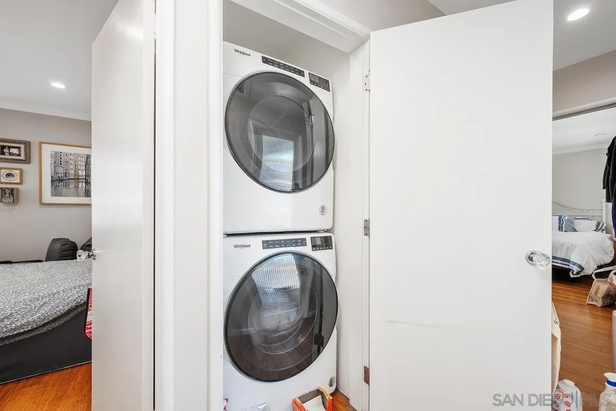 231 Sunridge Street Playa del Rey, CA 90293 - Photo 24 of 28 a view of a bedroom with washer and dryer