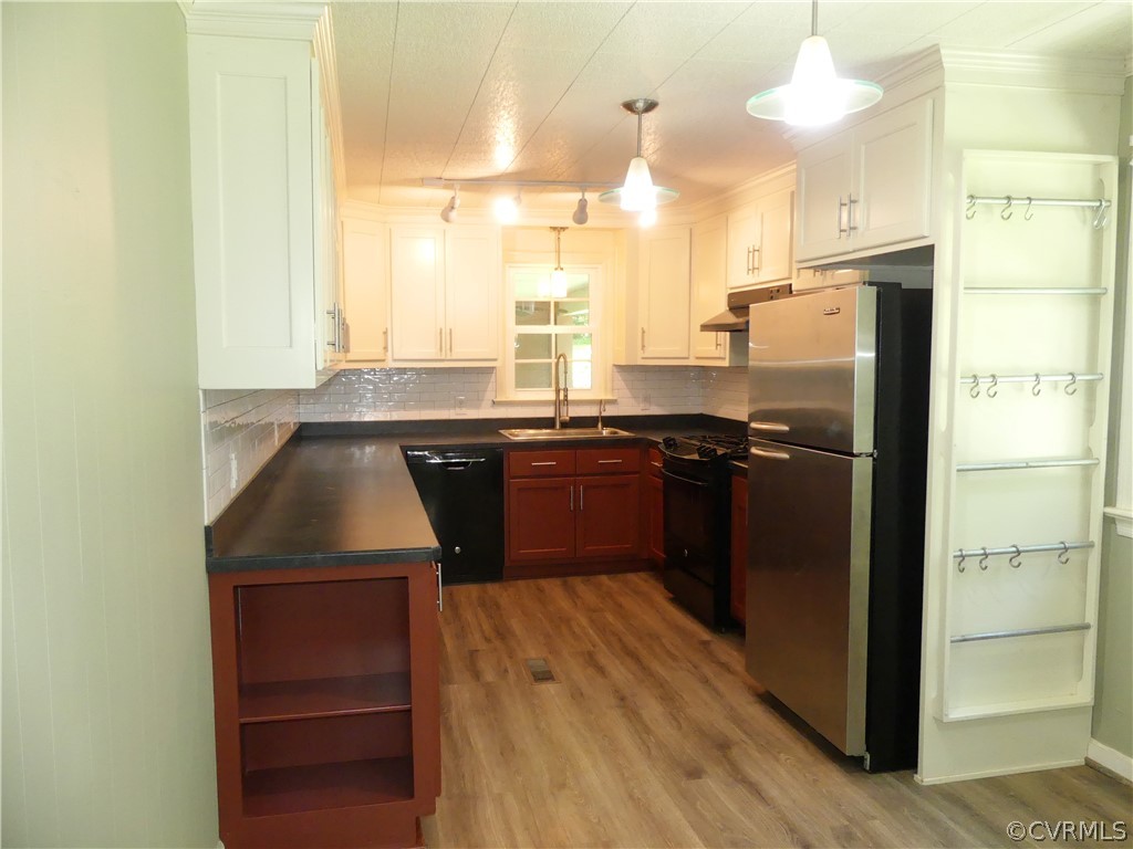 272 Germantown Road Keysville, VA 23947 - Photo 13 of 34 a kitchen with a sink a refrigerator and cabinets