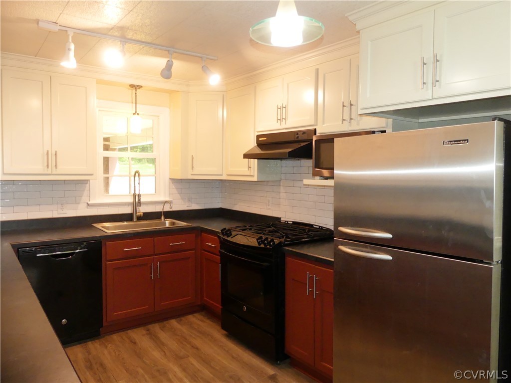 272 Germantown Road Keysville, VA 23947 - Photo 14 of 34 a kitchen with a sink stove and refrigerator