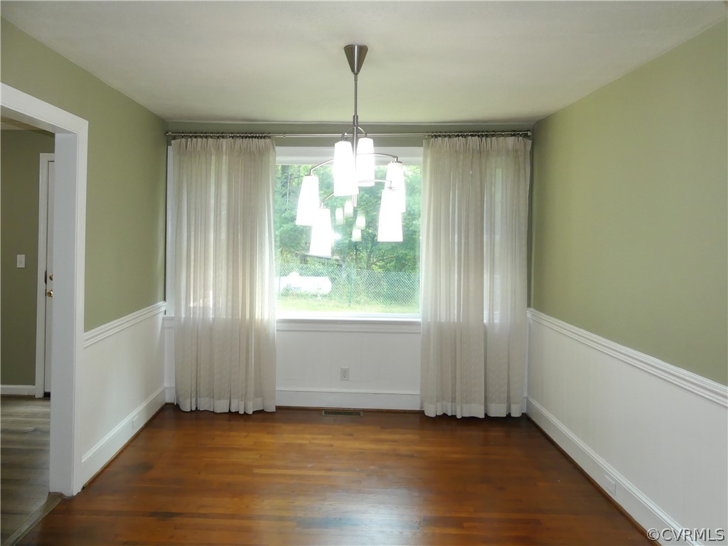 272 Germantown Road Keysville, VA 23947 - Photo 17 of 34 a view of an empty room with wooden floor and a window