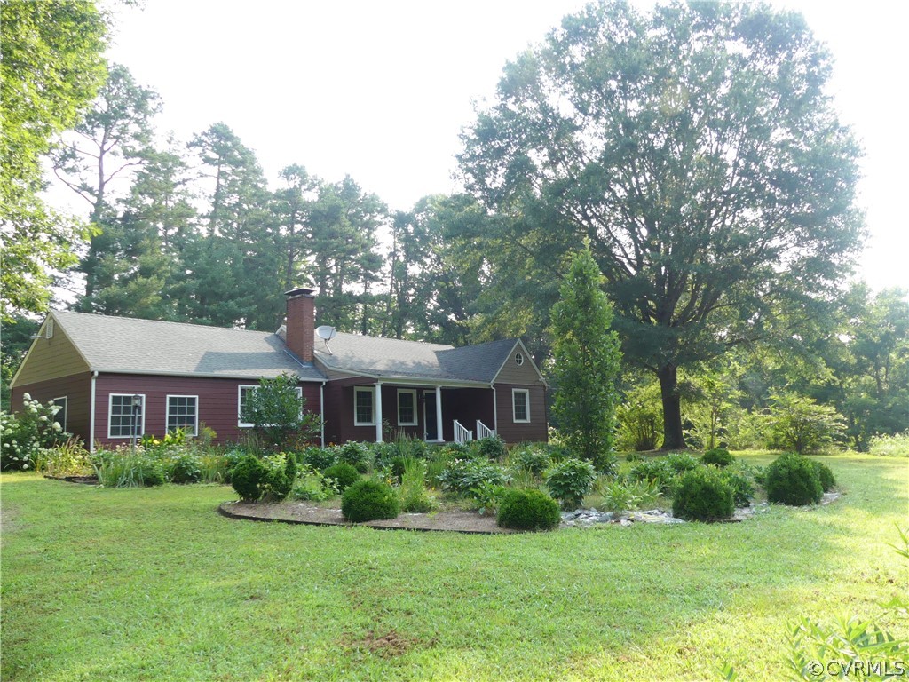 272 Germantown Road Keysville, VA 23947 - Photo 2 of 34 a front view of a house with a yard