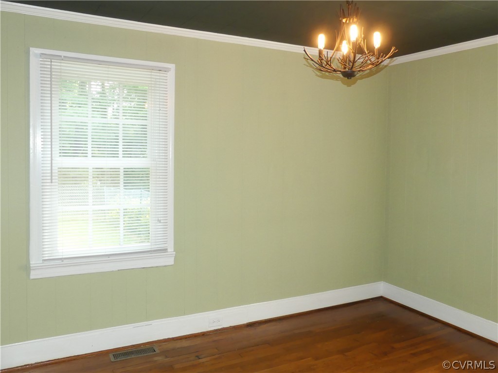 272 Germantown Road Keysville, VA 23947 - Photo 23 of 34 a view of a room with wooden floor and chandelier