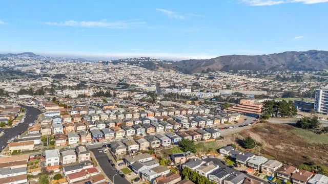 an aerial view of residential house and space