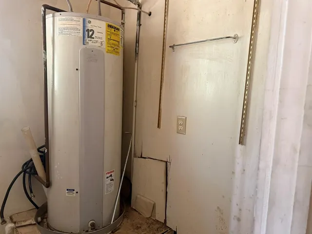 a bathroom with a shower and a mirror