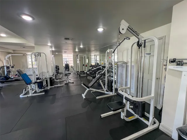 a view of a room with gym equipment