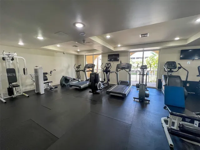 a view of a room with gym equipment