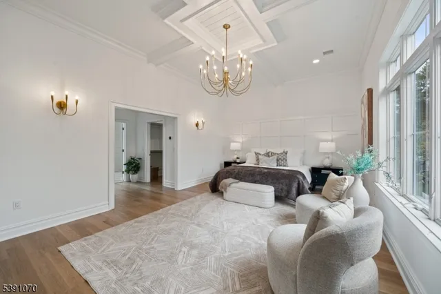 a bedroom with bed and a window