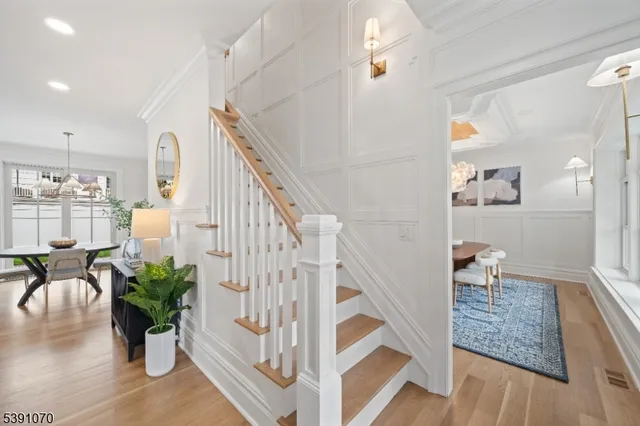 a view of entryway with wooden floor