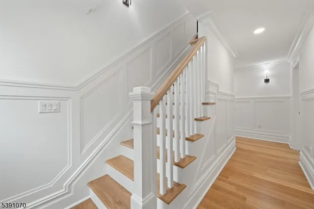 a view of entryway with wooden floor