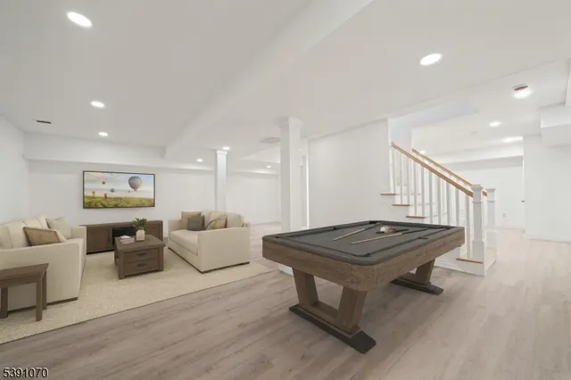 a living room with furniture and a table