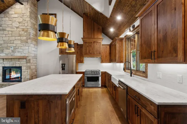 a kitchen with a stove and a sink