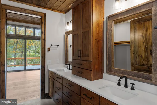 a white bath tub sitting next to a window
