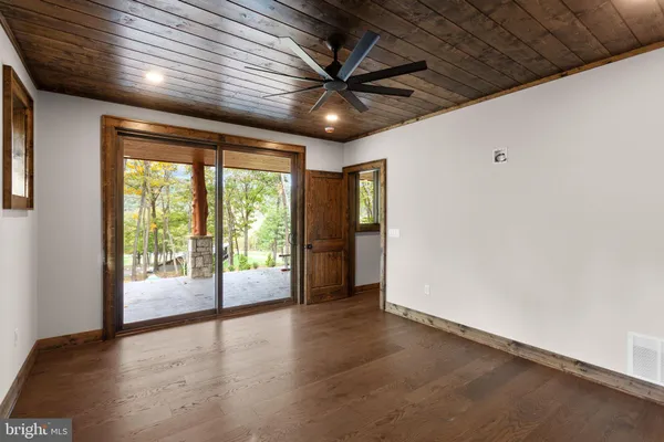 a view of a patio with a table chairs and a patio
