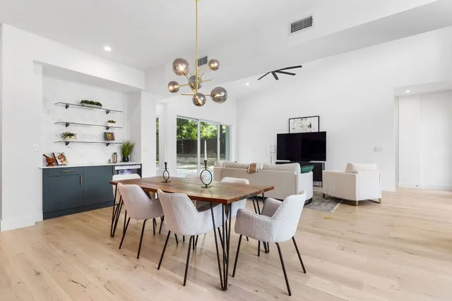 a view of a dining room with furniture