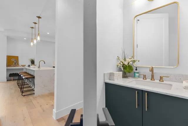 a room with cabinets and a potted plant