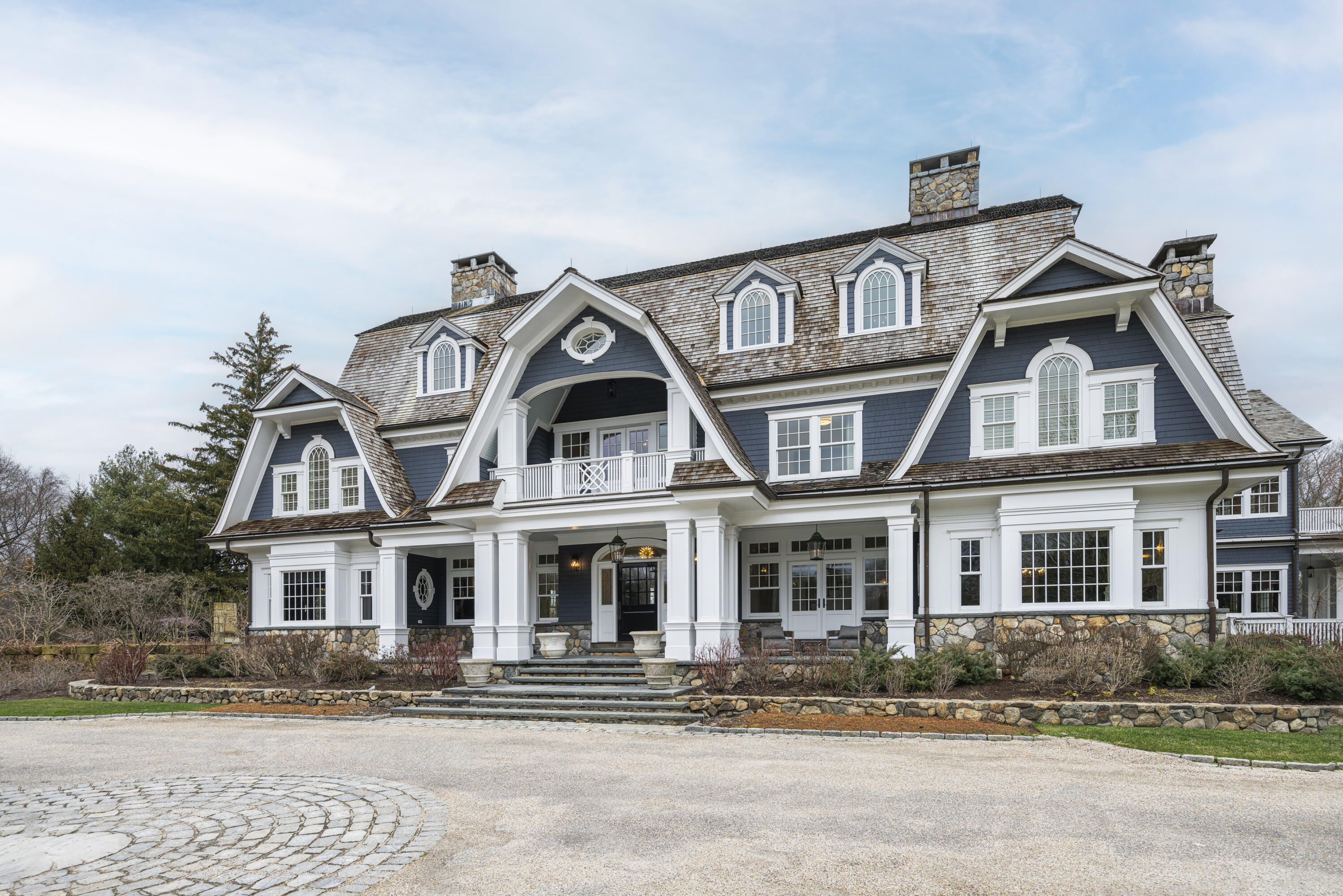 a view of a white building among the street