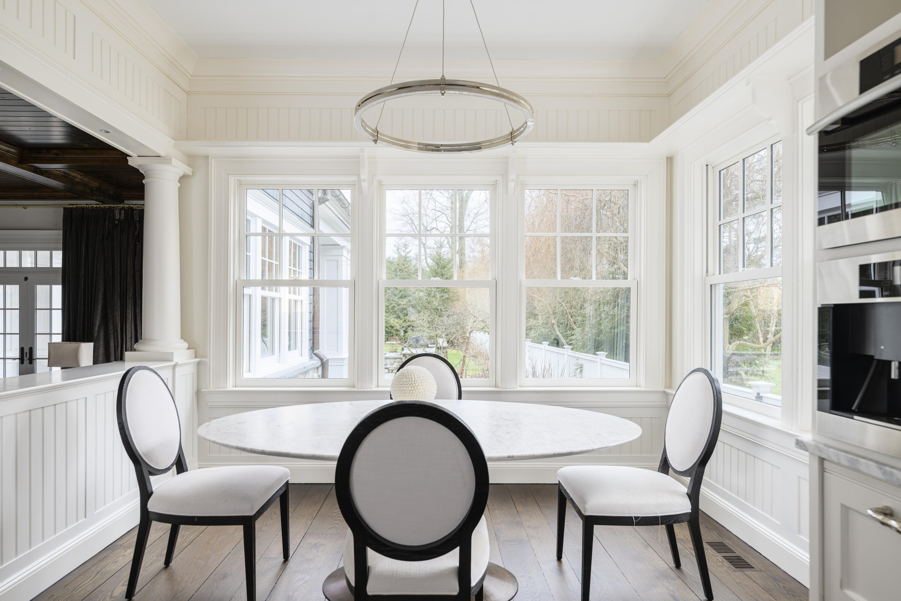 727 Smith Ridge Road New Canaan, CT 06840 - Photo 12 of 31 a view of a dining room with furniture window and outside view