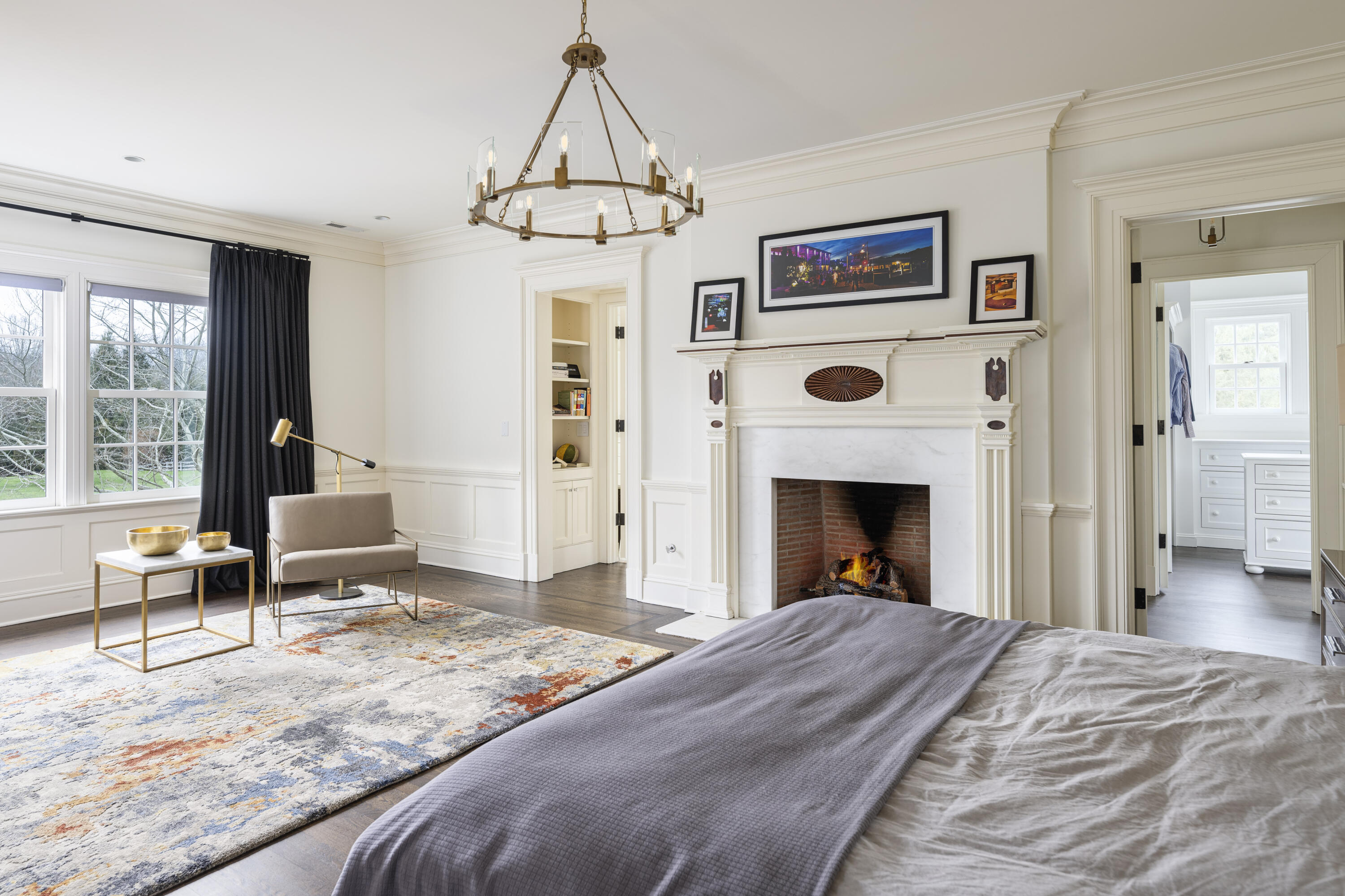 727 Smith Ridge Road New Canaan, CT 06840 - Photo 15 of 31 a bedroom with a bed and a fireplace