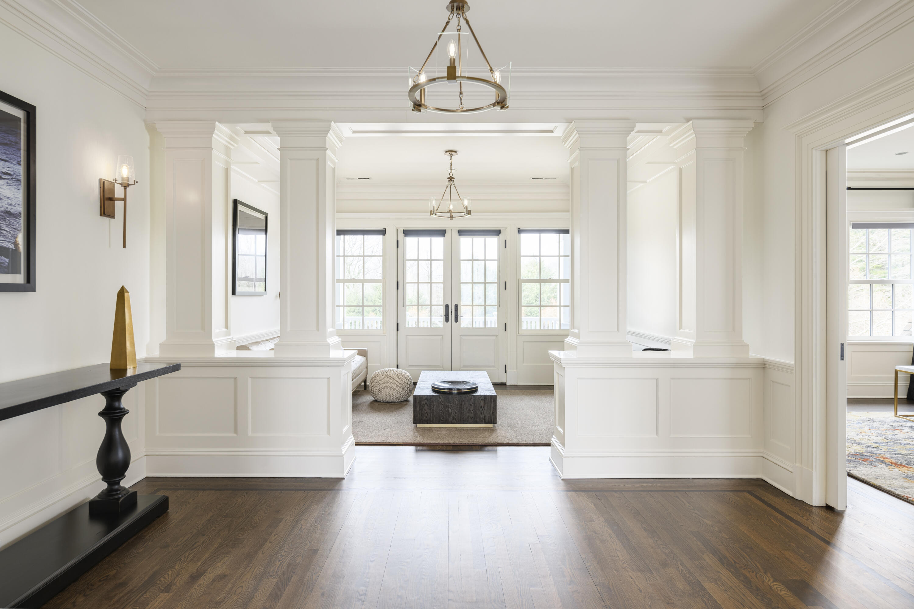 727 Smith Ridge Road New Canaan, CT 06840 - Photo 16 of 31 a living room with furniture a window and wooden floor