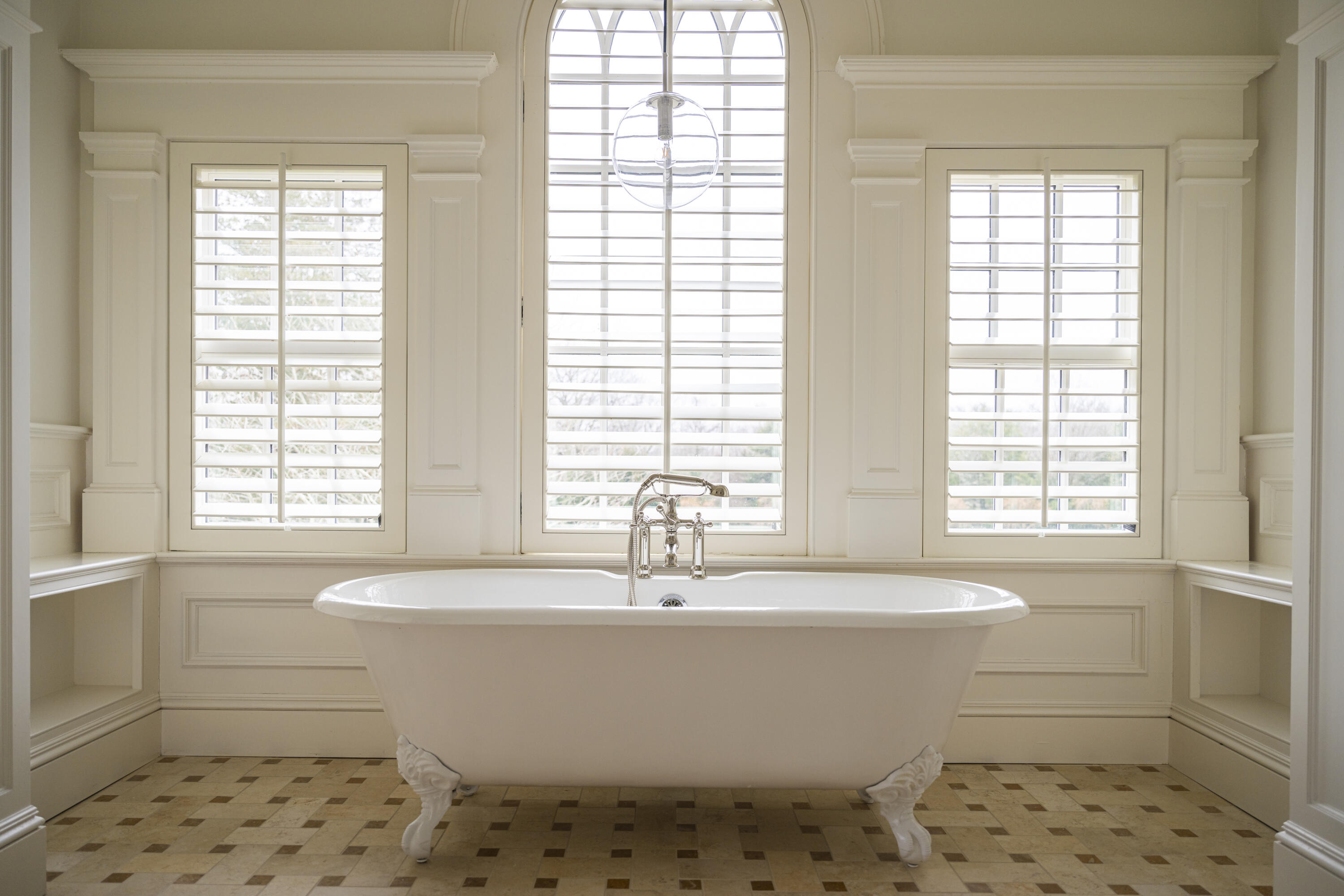 727 Smith Ridge Road New Canaan, CT 06840 - Photo 26 of 31 a white bath tub sitting in a bathroom next to a window