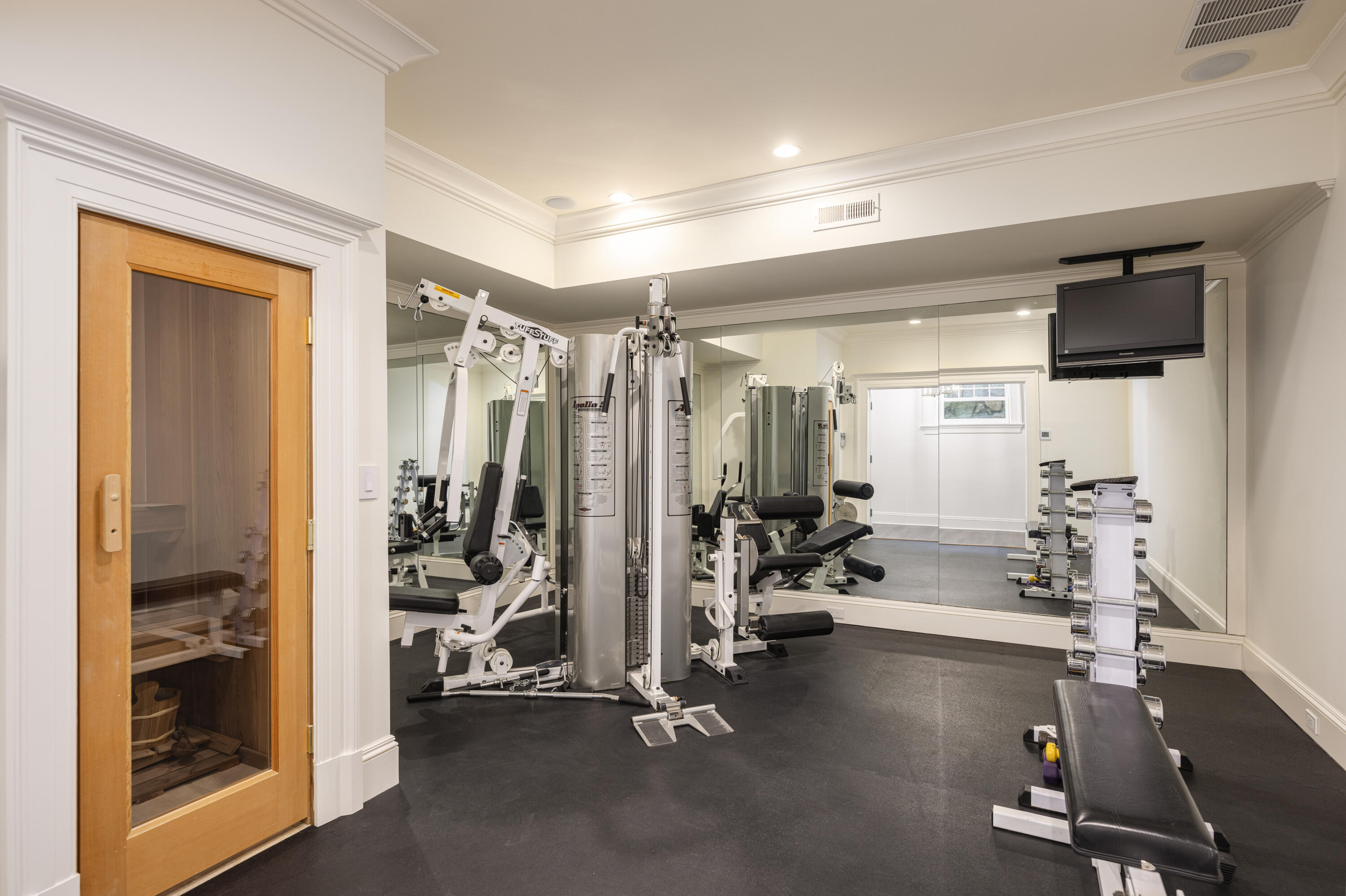 727 Smith Ridge Road New Canaan, CT 06840 - Photo 28 of 31 a view of a room with gym equipment
