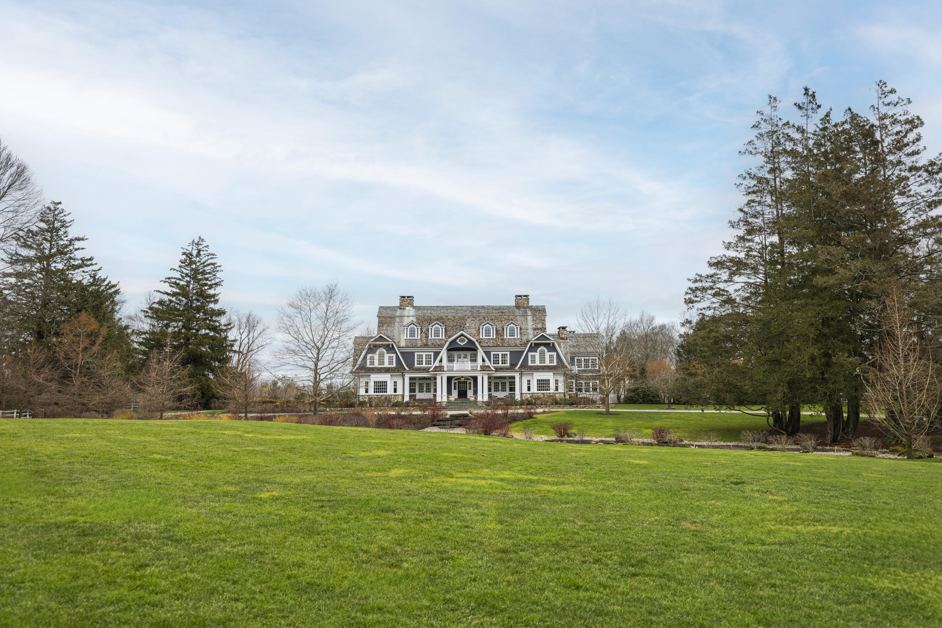 727 Smith Ridge Road New Canaan, CT 06840 - Photo 31 of 31 a view of a house with a big yard