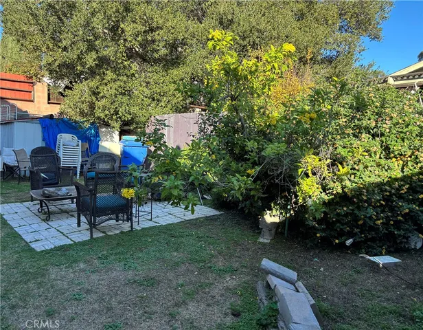 a garden view with a seating space