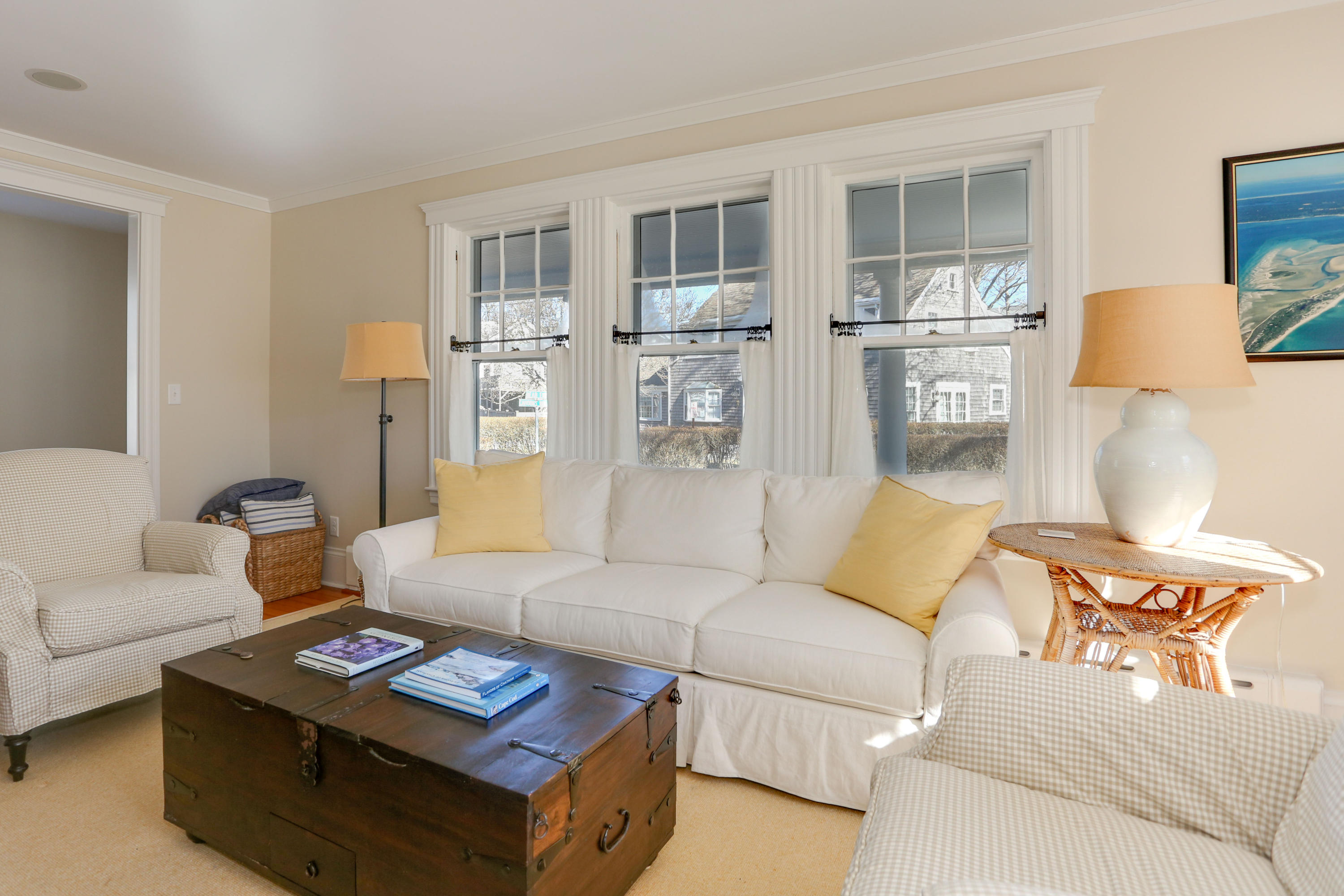 22 Mill Pond Road Chatham, MA 02633 - Photo 12 of 35 a living room with furniture and a table