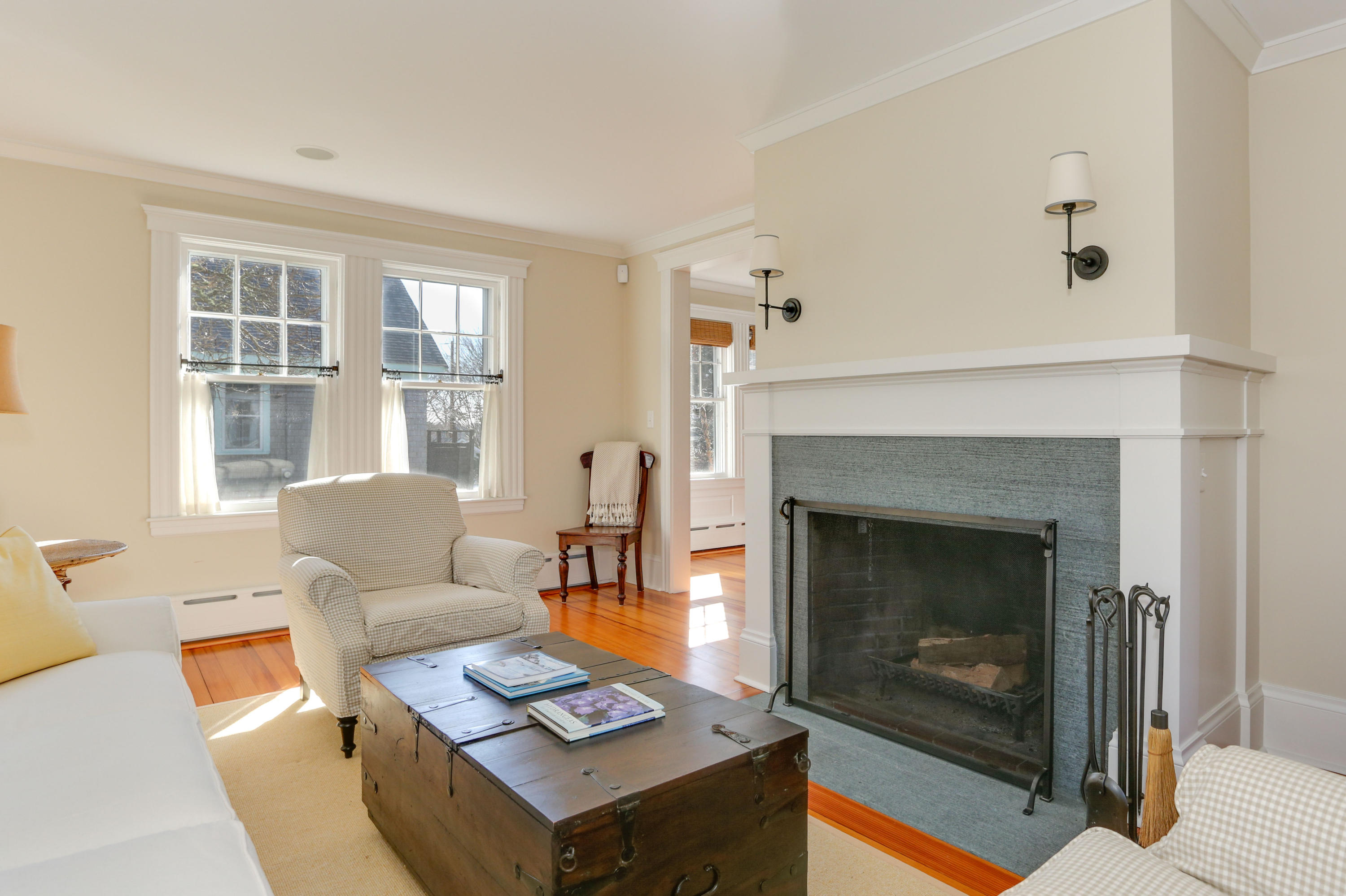 22 Mill Pond Road Chatham, MA 02633 - Photo 13 of 35 a living room with furniture and a fireplace