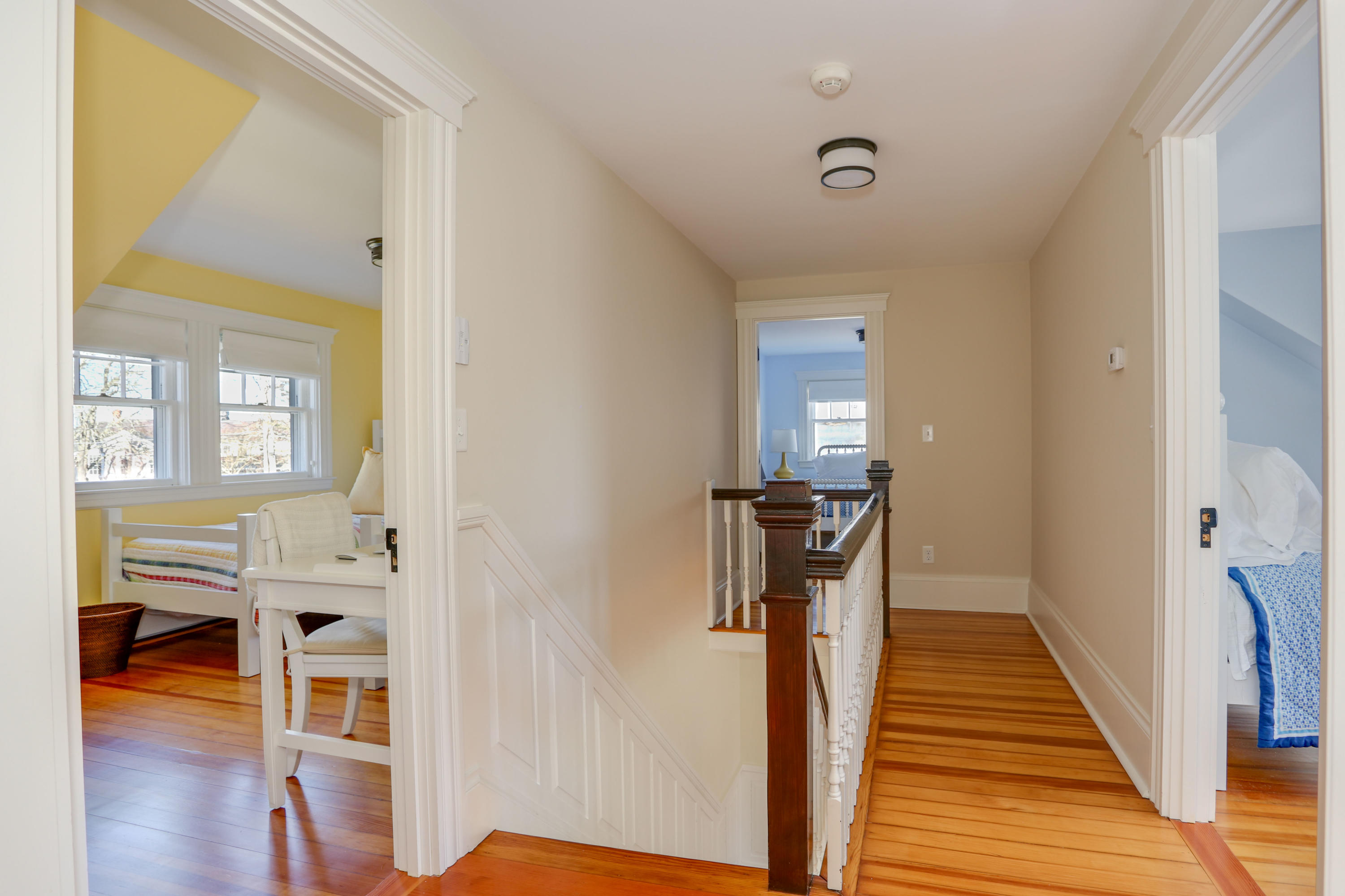 22 Mill Pond Road Chatham, MA 02633 - Photo 15 of 35 a view of a hallway with wooden floor and staircase