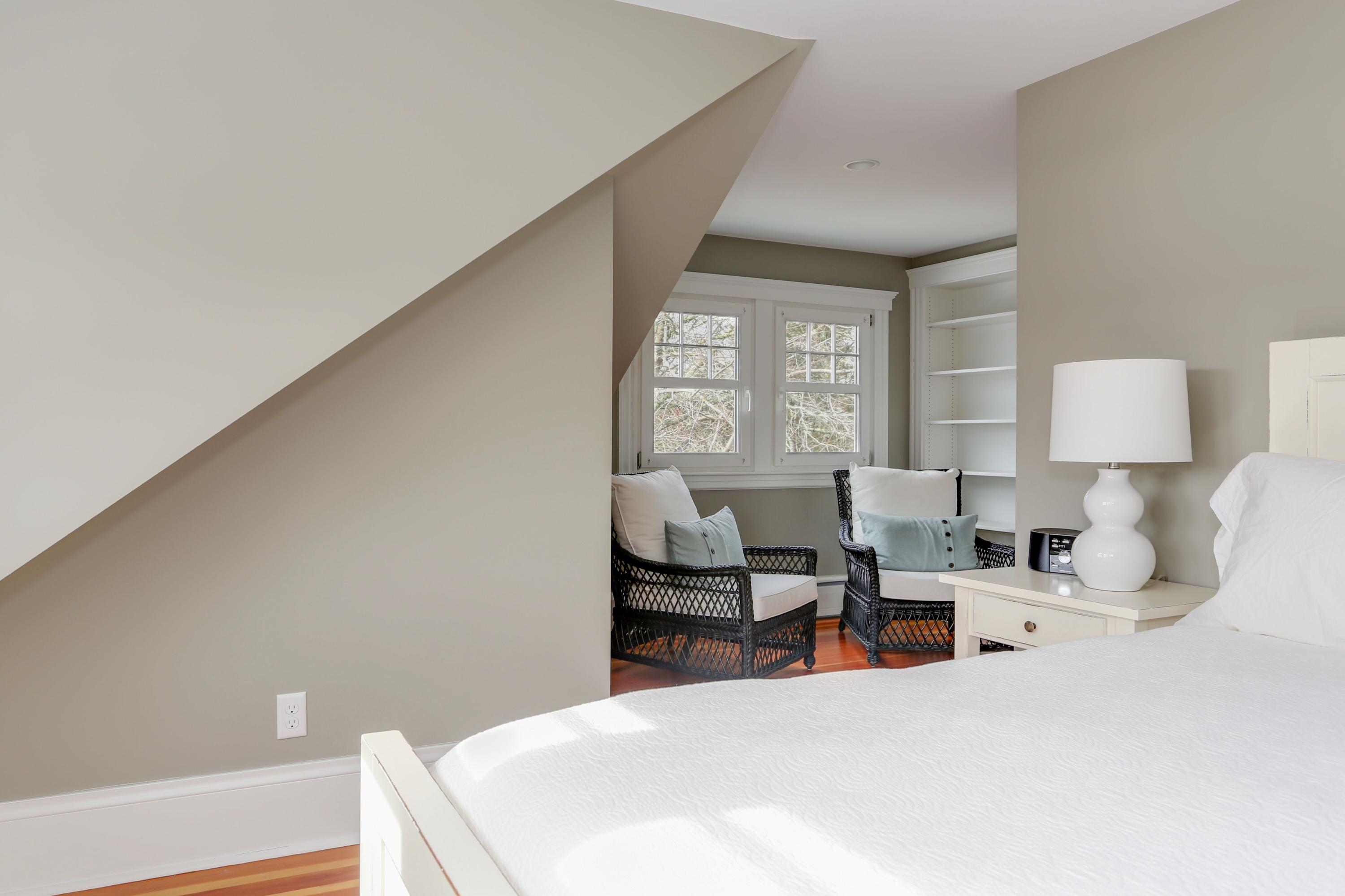 22 Mill Pond Road Chatham, MA 02633 - Photo 22 of 35 a bedroom with a bed and a lamp on table