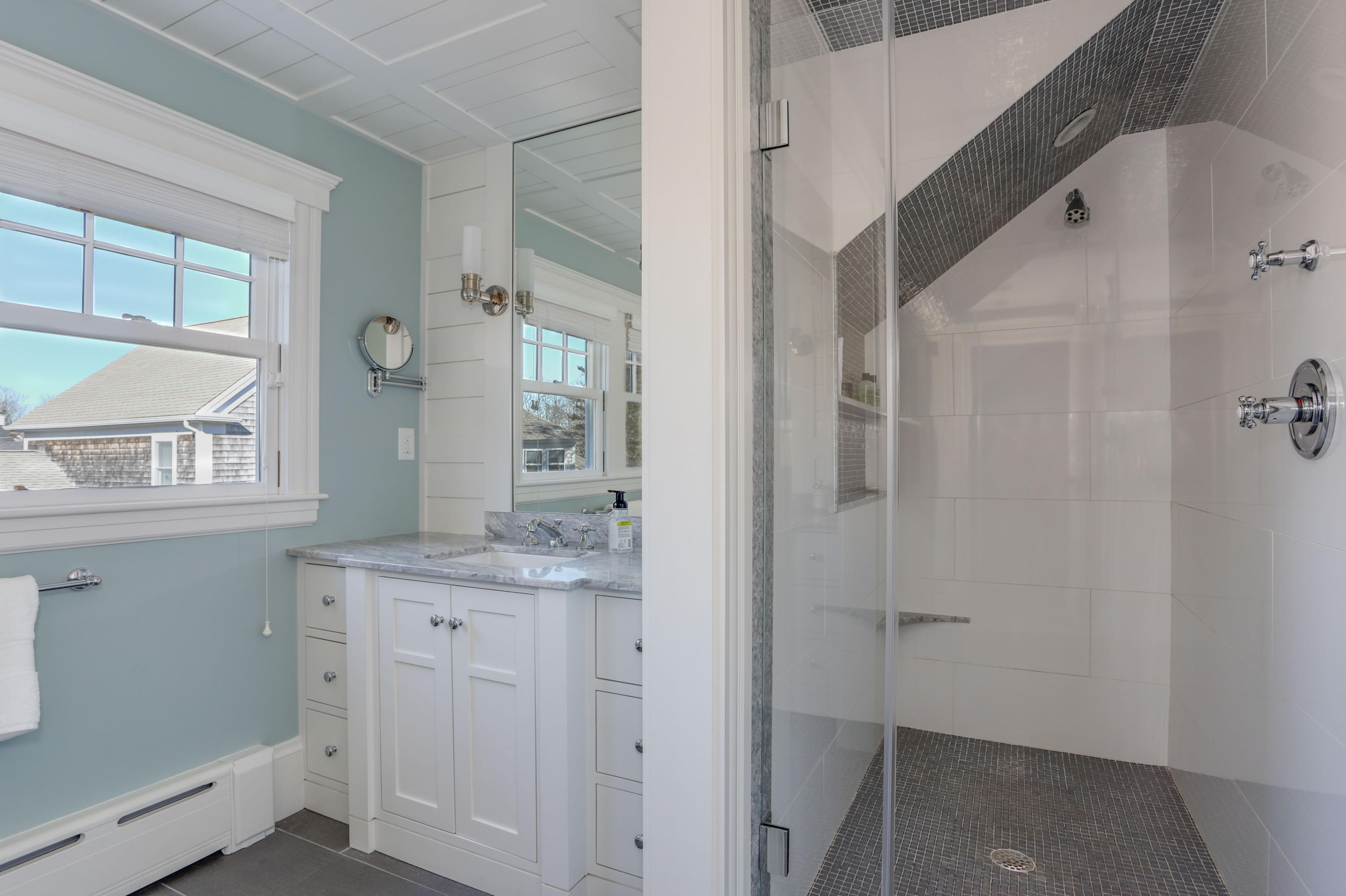 22 Mill Pond Road Chatham, MA 02633 - Photo 25 of 35 a bathroom with a granite countertop sink and a window