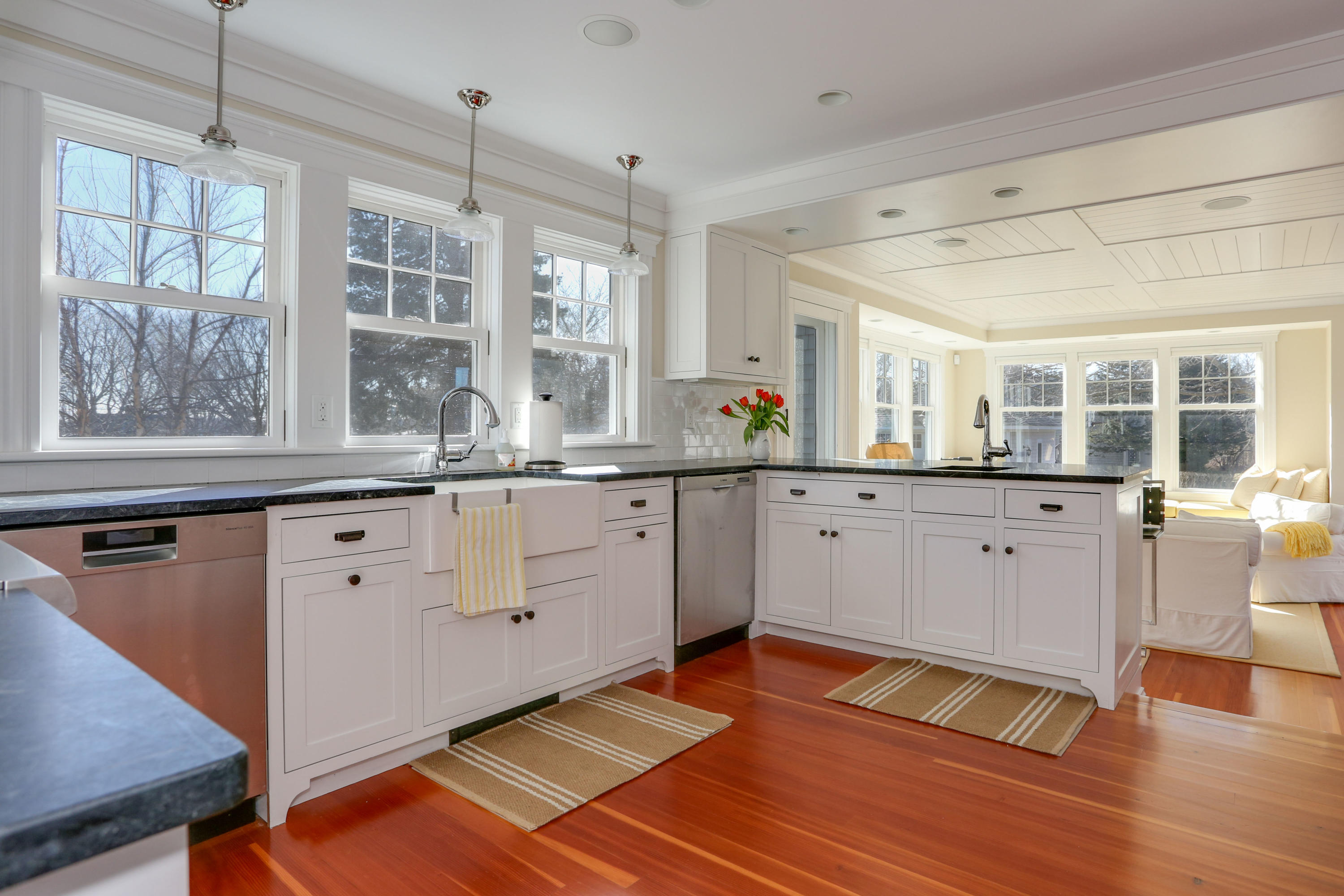 22 Mill Pond Road Chatham, MA 02633 - Photo 5 of 35 a kitchen with stainless steel appliances sink and wooden floor