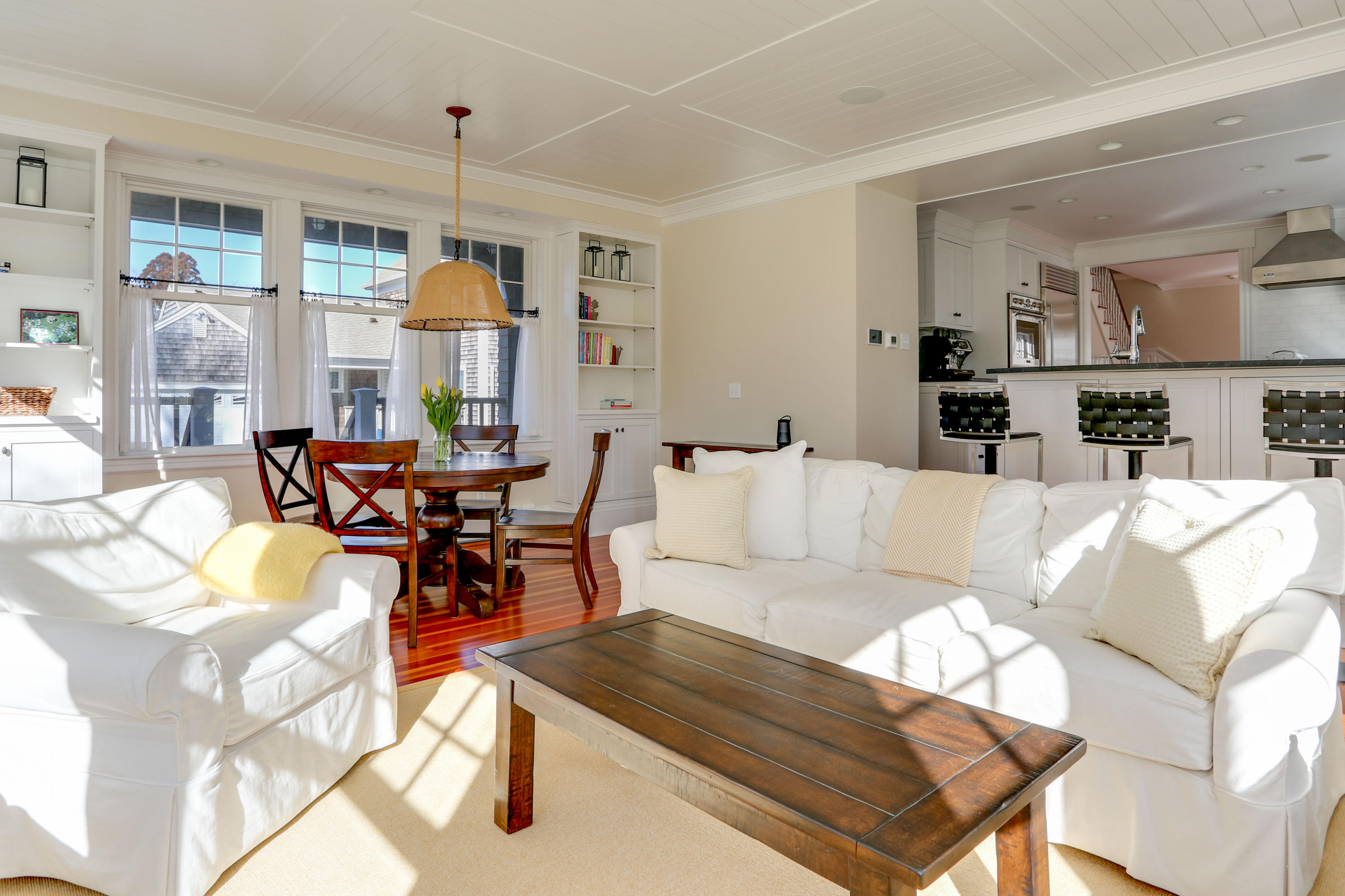 22 Mill Pond Road Chatham, MA 02633 - Photo 9 of 35 a living room with furniture and a table