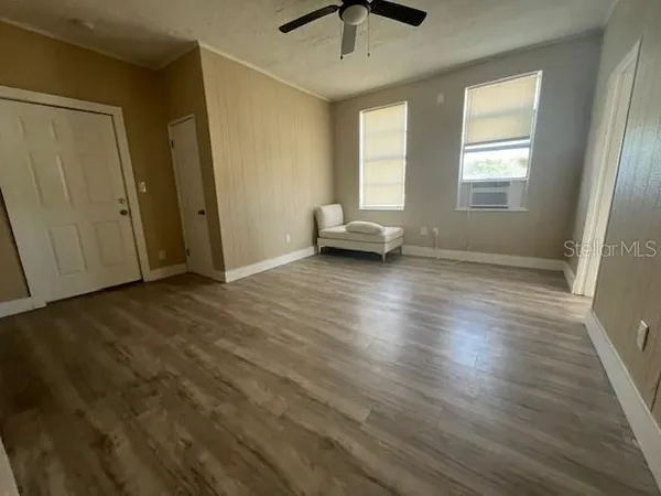 a view of livingroom with hardwood floor and window