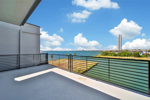 a view of a balcony with an outdoor space