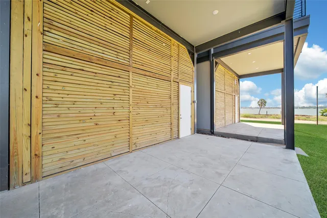a view of an empty room with a balcony