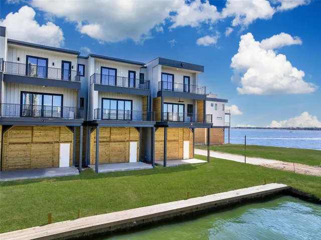 a view of a house with a big yard