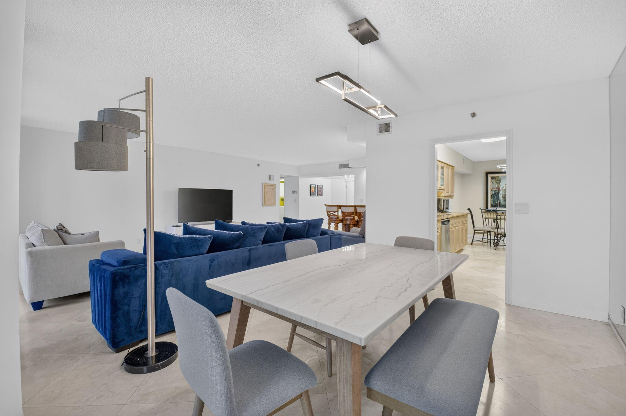 1401 South Ocean Boulevard, Unit 1060 Boca Raton, FL 33432 - Photo 9 of 46 a view of a dining room with furniture