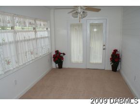 2671 Spring Court DeLand, FL 32720 - Photo 5 of 11 a view of an empty room