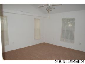 2671 Spring Court DeLand, FL 32720 - Photo 6 of 11 a view of an empty room