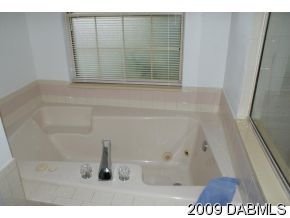 2671 Spring Court DeLand, FL 32720 - Photo 7 of 11 a bathroom with a shower
