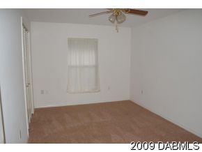 2671 Spring Court DeLand, FL 32720 - Photo 9 of 11 a view of an empty room